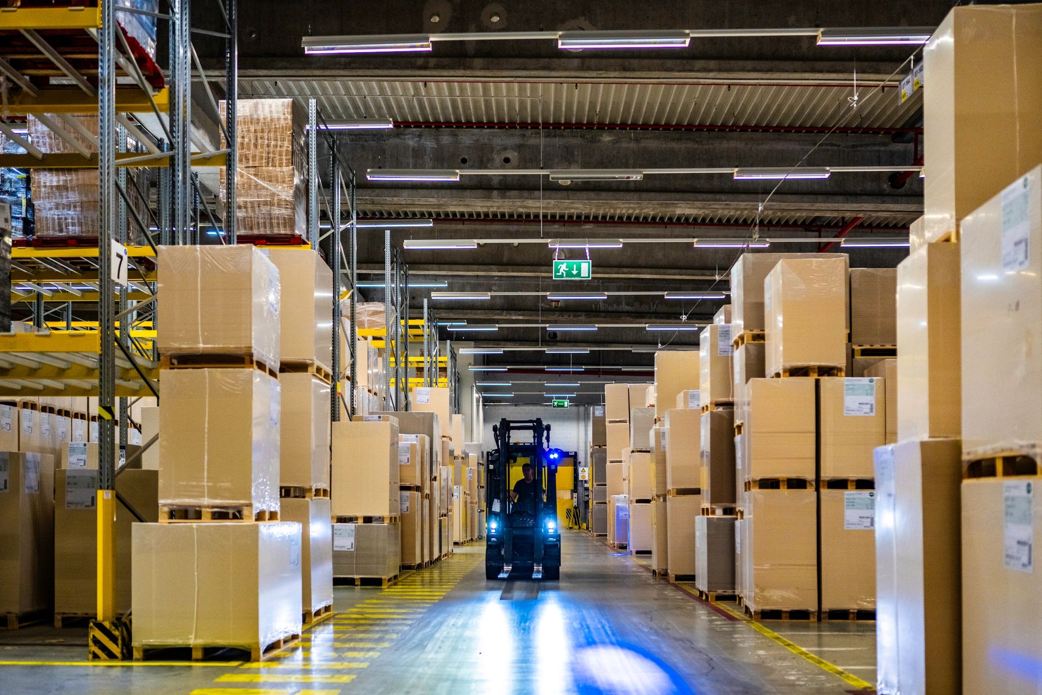 Large commercial facility interior with active operations