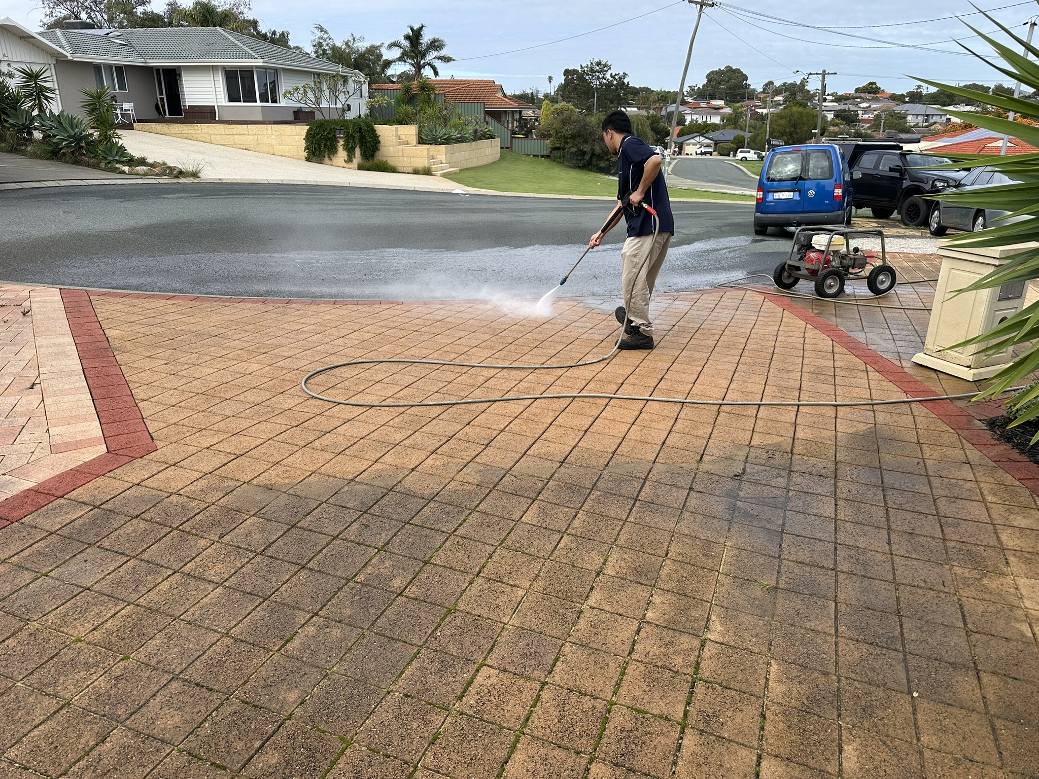 Pressure washing service on a hard surface area